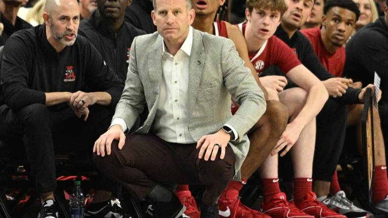 Dec 16, 2023; Omaha, Nebraska, USA;  Alabama Crimson Tide head coach Nate Oats watches action against the Creighton Bluejays in the first half  at CHI Health Center Omaha. Mandatory Credit: Steven Branscombe-USA TODAY Sports