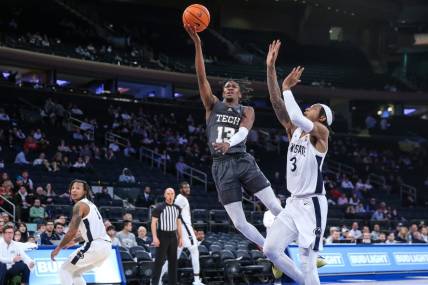 Dec 16, 2023; New York, New York, USA;  Georgia Tech Yellow Jackets guard Miles Kelly (13) and Penn State Nittany Lions guard Nick Kern Jr. (3) at Madison Square Garden. Mandatory Credit: Wendell Cruz-USA TODAY Sports