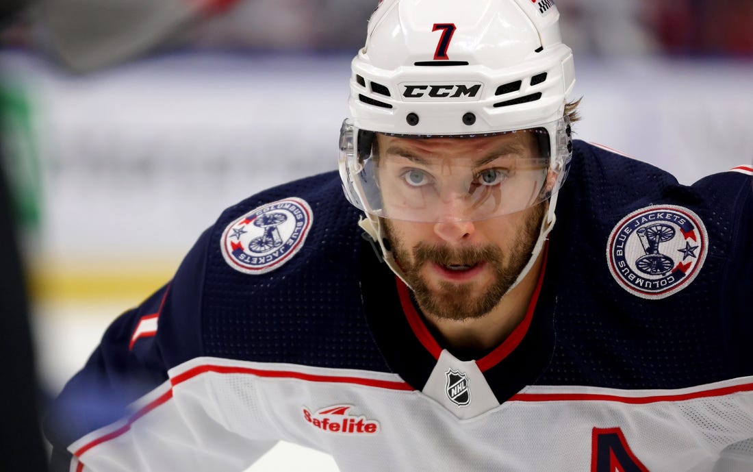 Dec 19, 2023; Buffalo, New York, USA;  Columbus Blue Jackets center Sean Kuraly (7) waits for the face-off during the first period against the Buffalo Sabres at KeyBank Center. Mandatory Credit: Timothy T. Ludwig-USA TODAY Sports