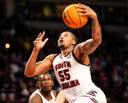 Dec 19, 2023; Columbia, South Carolina, USA; South Carolina Gamecocks guard Ta'Lon Cooper (55) drives against the Winthrop Eagles in the first half at Colonial Life Arena. Mandatory Credit: Jeff Blake-USA TODAY Sports