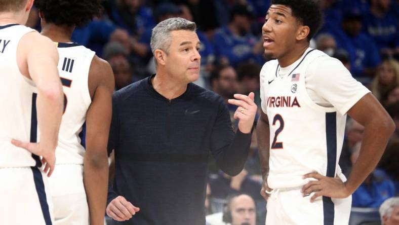 Dec 19, 2023; Memphis, Tennessee, USA; Virginia Cavaliers head coach Tony Bennett reacts during a time out  during the first half against the Memphis Tigers at FedExForum. Mandatory Credit: Petre Thomas-USA TODAY Sports