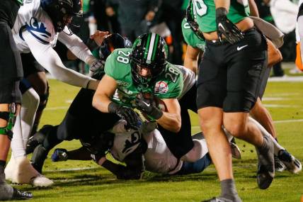 Dec 19, 2023; Frisco, TX, USA; Marshall Thundering Herd running back Ethan Payne (28) scores a touchdown during the first quarter against the UTSA Roadrunners at Toyota Stadium. Mandatory Credit: Andrew Dieb-USA TODAY Sports