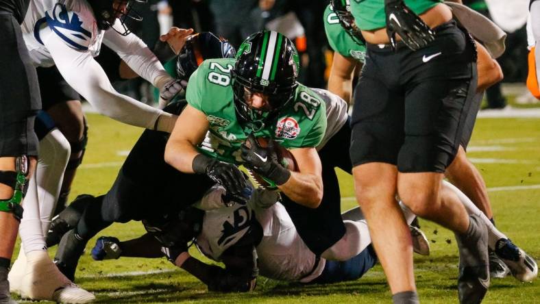 Dec 19, 2023; Frisco, TX, USA; Marshall Thundering Herd running back Ethan Payne (28) scores a touchdown during the first quarter against the UTSA Roadrunners at Toyota Stadium. Mandatory Credit: Andrew Dieb-USA TODAY Sports