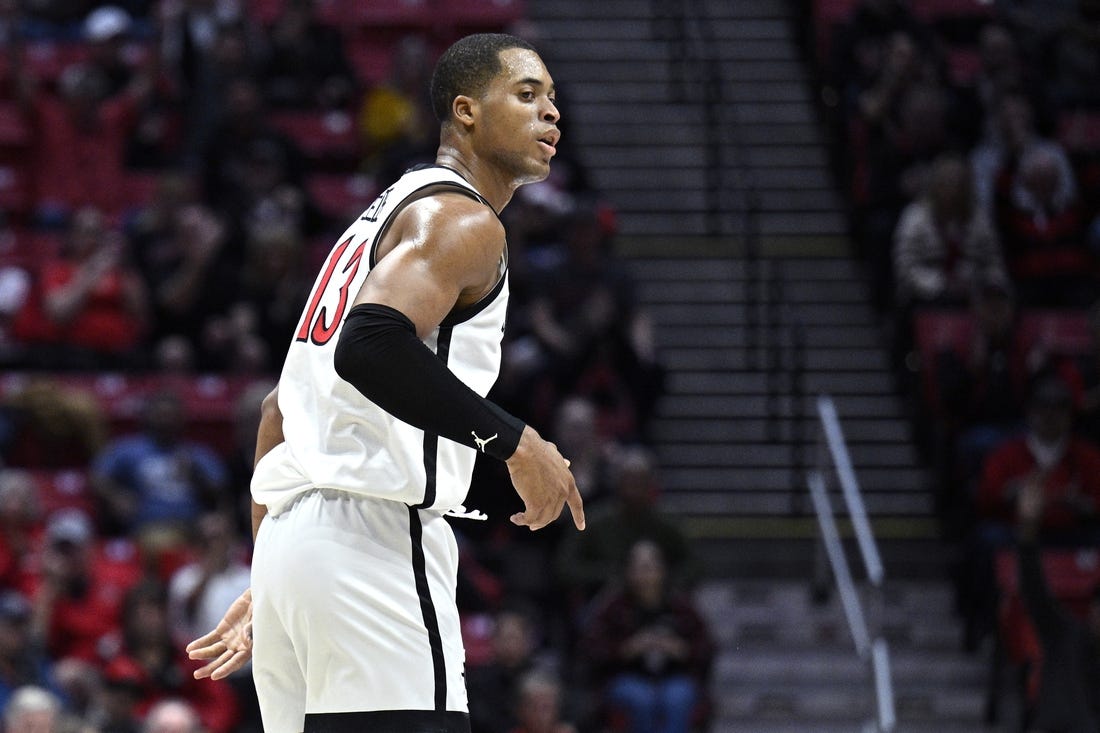 Dec 19, 2023; San Diego, California, USA; San Diego State Aztecs forward Jaedon LeDee (13) reacts after a three-point basket against the Saint Katherine Firebirds during the first half at Viejas Arena. Mandatory Credit: Orlando Ramirez-USA TODAY Sports