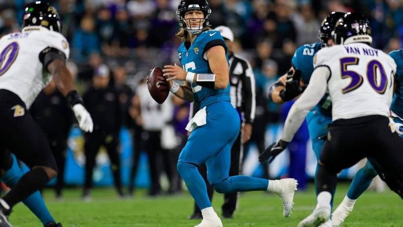 Jacksonville Jaguars quarterback Trevor Lawrence (16) looks to pass Jacksonville Jaguars quarterback Trevor Lawrence (16) looks to pass during the second quarter of a regular season NFL football matchup Sunday, Dec. 17, 2023 at EverBank Stadium in Jacksonville, Fla. The Baltimore Ravens defeated the Jacksonville Jaguars 23-7. [Corey Perrine/Florida Times-Union]