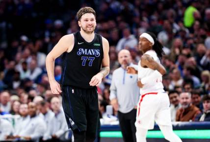 Dec 20, 2023; Dallas, Texas, USA;  Dallas Mavericks guard Luka Doncic (77) reacts after scoring during the second quarter against the LA Clippers at American Airlines Center. Mandatory Credit: Kevin Jairaj-USA TODAY Sports