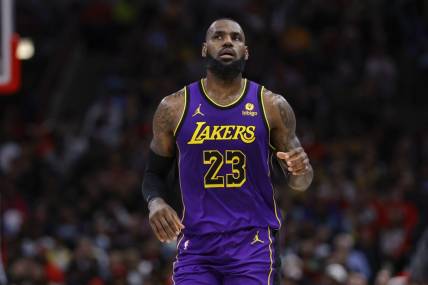 Dec 20, 2023; Chicago, Illinois, USA; Los Angeles Lakers forward LeBron James (23) looks on during the first half at United Center. Mandatory Credit: Kamil Krzaczynski-USA TODAY Sports
