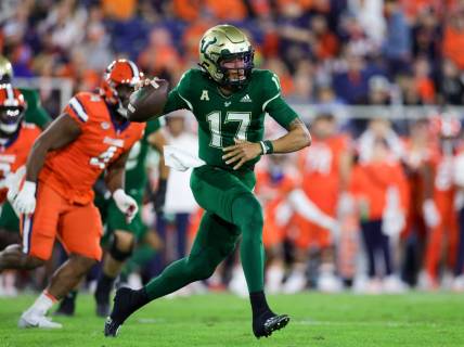 Dec 21, 2023; Boca Raton, FL, USA; South Florida Bulls quarterback Byrum Brown (17) drops back to pass against the Syracuse Orange in the first quarter during the RoofClaim.com Boca Raton Bowl at FAU Stadium. Mandatory Credit: Nathan Ray Seebeck-USA TODAY Sports