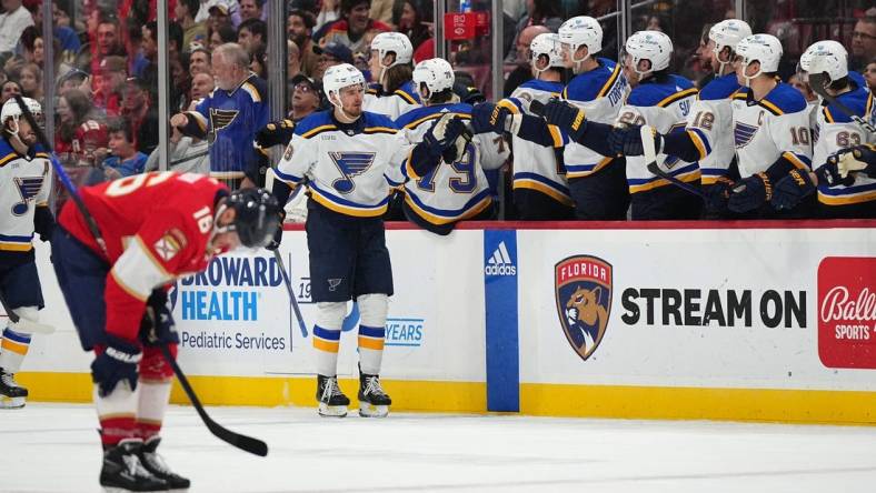 Dec 21, 2023; Sunrise, Florida, USA; St. Louis Blues left wing Pavel Buchnevich (89) celebrates his goal against the Florida Panthers with teamates on the bench during the second period at Amerant Bank Arena. Mandatory Credit: Jasen Vinlove-USA TODAY Sports