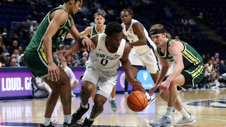 Dec 21, 2023; University Park, Pennsylvania, USA; Penn State Nittany Lions guard Kanye Clary (0) tries to maintain control of the ball during the first half against the Le Moyne Dolphins at Bryce Jordan Center. Penn State defeated Le Moyne 72-55. Mandatory Credit: Matthew O'Haren-USA TODAY Sports