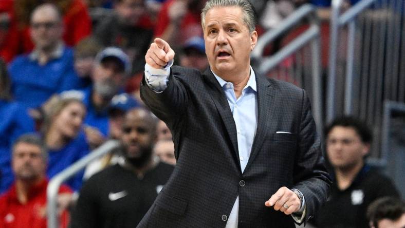 Dec 21, 2023; Louisville, Kentucky, USA;  Kentucky Wildcats head coach John Calipari gives instruction during the second half against the Louisville Cardinals at KFC Yum! Center. Kentucky defeated Louisville 95-76. Mandatory Credit: Jamie Rhodes-USA TODAY Sports