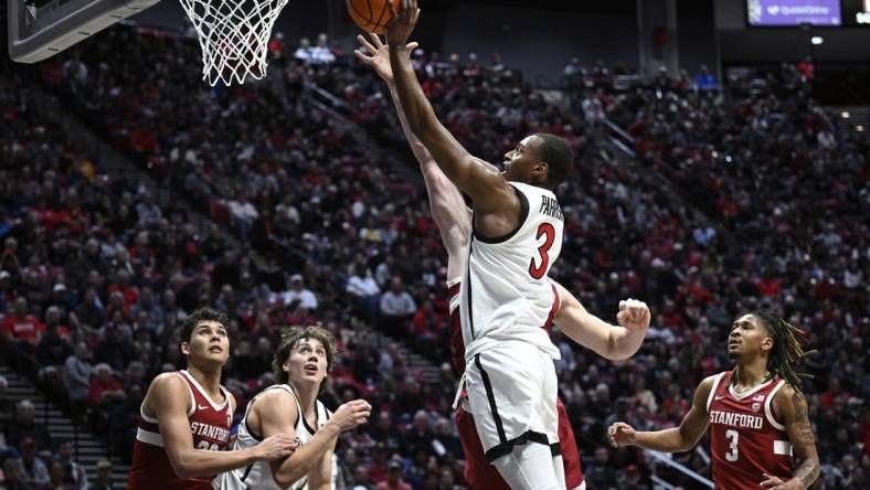 Dec 21, 2023; San Diego, California, USA; San Diego State Aztecs guard Micah Parrish (3) goes to the basket against the Stanford Cardinal during the first half at Viejas Arena. Mandatory Credit: Orlando Ramirez-USA TODAY Sports