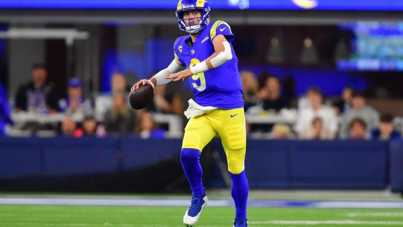 Dec 21, 2023; Inglewood, California, USA; Los Angeles Rams quarterback Matthew Stafford (9) throws against the New Orleans Saints during the first half at SoFi Stadium. Mandatory Credit: Gary A. Vasquez-USA TODAY Sports