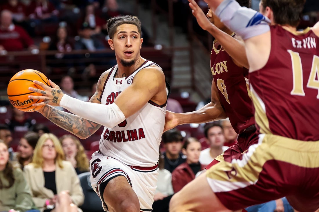 Dec 22, 2023; Columbia, South Carolina, USA; South Carolina Gamecocks guard Myles Stute (10) looks to pass against the Elon Phoenix in the first half at Colonial Life Arena. Mandatory Credit: Jeff Blake-USA TODAY Sports
