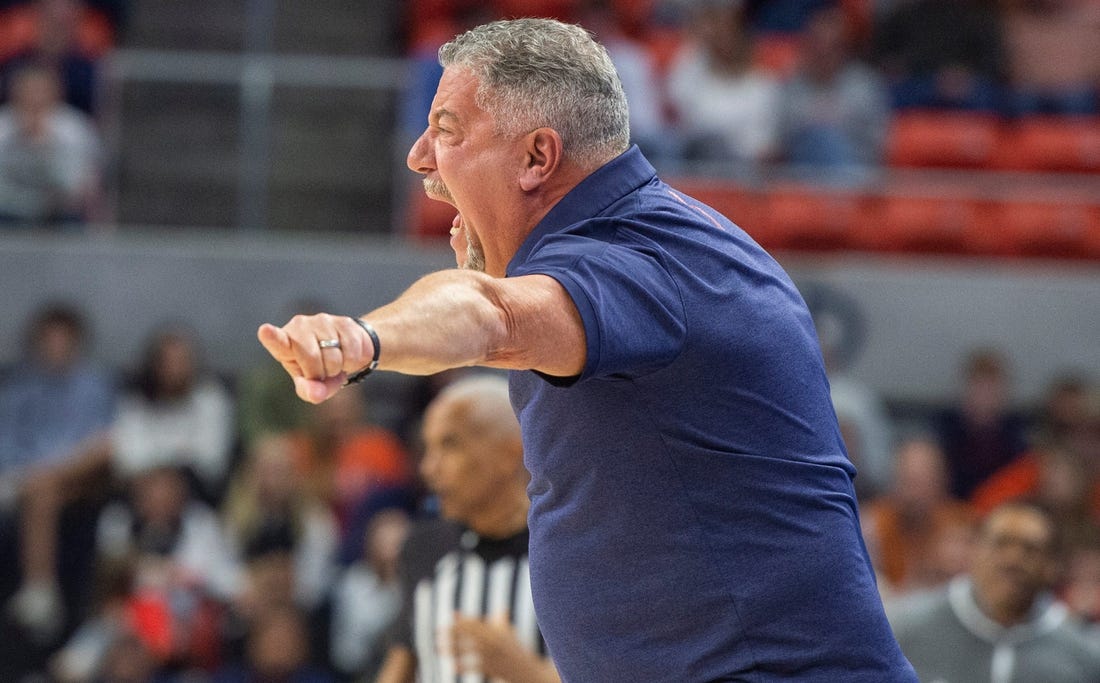 Auburn Tigers head coach Bruce Pearl talks with his team from the sideline as Auburn Tigers take on Alabama State Hornets at Neville Arena in Auburn, Ala., on Friday, Dec. 22, 2023.