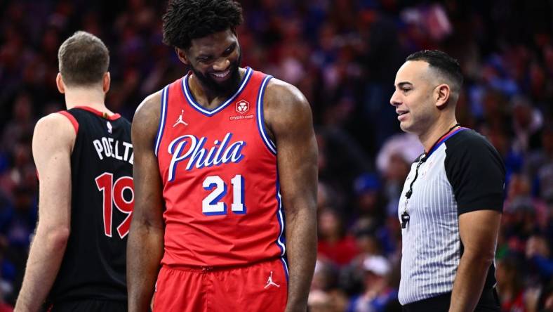 Dec 22, 2023; Philadelphia, Pennsylvania, USA; Philadelphia 76ers center Joel Embiid (21) reacts against the Toronto Raptors in the third quarter at Wells Fargo Center. Mandatory Credit: Kyle Ross-USA TODAY Sports