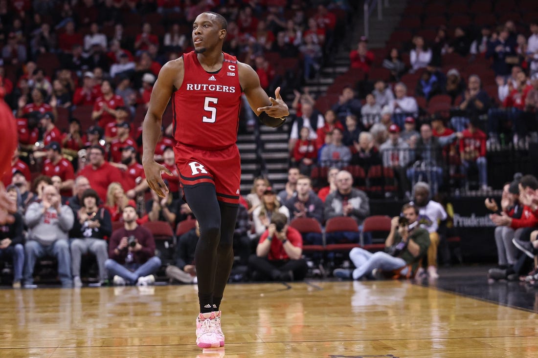 Dec 23, 2023; Newark, NY, USA; Rutgers Scarlet Knights forward Aundre Hyatt (5) reacts after a three point basket during the first half against the Mississippi State Bulldogs at Prudential Center. Mandatory Credit: Vincent Carchietta-USA TODAY Sports