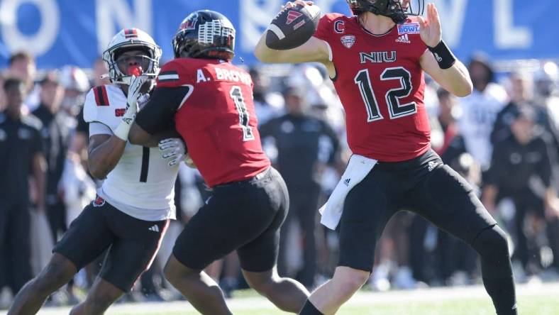 Northern Illinois Huskies quarterback Rocky Lombardi (12) passes against the Arkansas State Red Wolves in first half action in the Camellia Bowl at Cramton Bowl in Montgomery, Ala., on Saturday December 23, 2023.