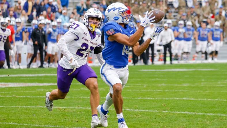 Dec 23, 2023; Fort Worth, TX, USA;  Air Force Falcons wide receiver Jared Roznos (13) catches a touchdown reception late in the second quarter with James Madison Dukes safety Jacob Thomas (27) defending at Amon G. Carter Stadium. Mandatory Credit: Andrew Dieb-USA TODAY Sports