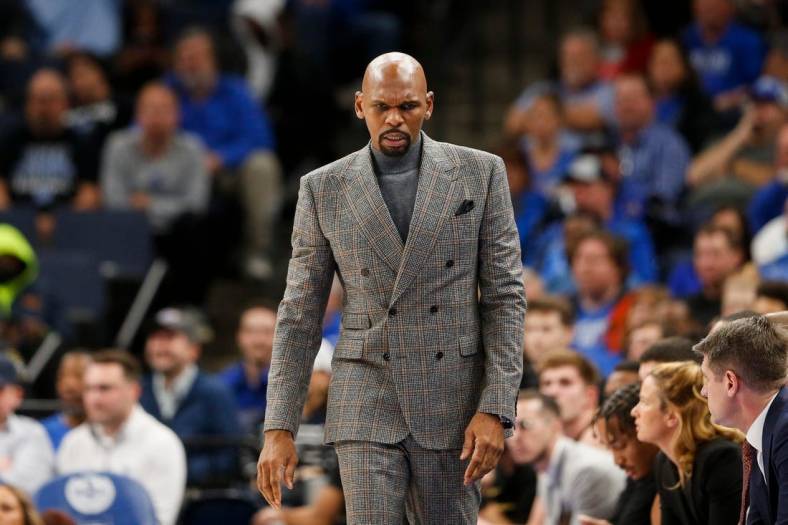 Vanderbilt's head coach Jerry Stackhouse looks down while watching his team on offense during the game between Vanderbilt University and University of Memphis at FedExForum in Memphis, Tenn., on Saturday, December 23, 2023.
