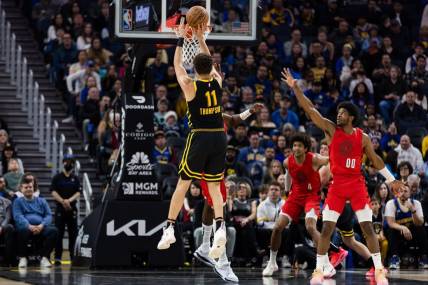 Dec 23, 2023; San Francisco, California, USA; Golden State Warriors forward Klay Thompson (11) takes a three-point shot against the Portland Trail Blazers during the first half at Chase Center. Mandatory Credit: John Hefti-USA TODAY Sports