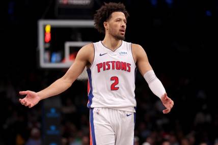 Dec 23, 2023; Brooklyn, New York, USA; Detroit Pistons guard Cade Cunningham (2) reacts during the fourth quarter against the Brooklyn Nets at Barclays Center. Mandatory Credit: Brad Penner-USA TODAY Sports
