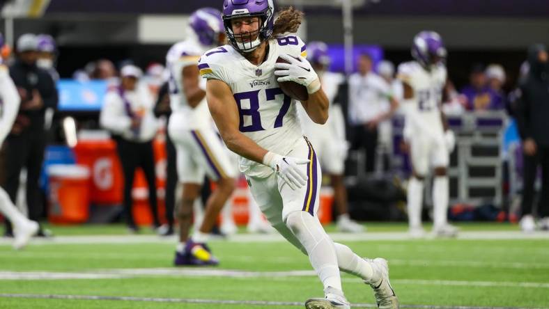 Dec 24, 2023; Minneapolis, Minnesota, USA; Minnesota Vikings tight end T.J. Hockenson (87) warms up before the game against the Detroit Lions at U.S. Bank Stadium. Mandatory Credit: Matt Krohn-USA TODAY Sports