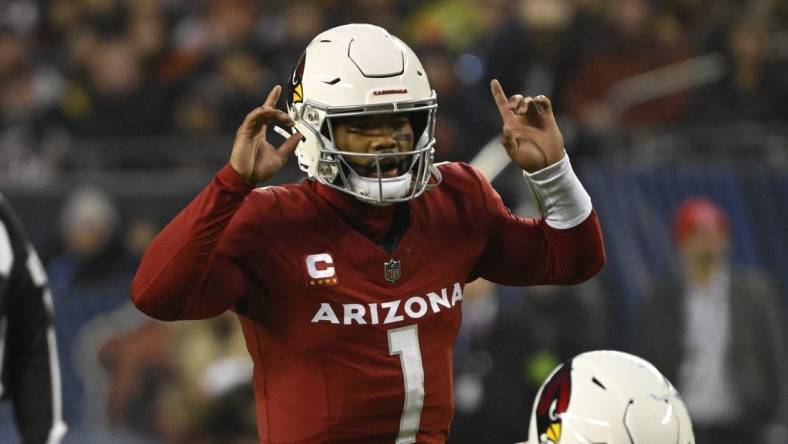 Dec 24, 2023; Chicago, Illinois, USA;  Arizona Cardinals quarterback Kyler Murray (1) signals to his team against the Chicago Bears during the first half at Soldier Field. Mandatory Credit: Matt Marton-USA TODAY Sports