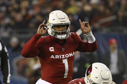 Dec 24, 2023; Chicago, Illinois, USA;  Arizona Cardinals quarterback Kyler Murray (1) signals to his team against the Chicago Bears during the first half at Soldier Field. Mandatory Credit: Matt Marton-USA TODAY Sports