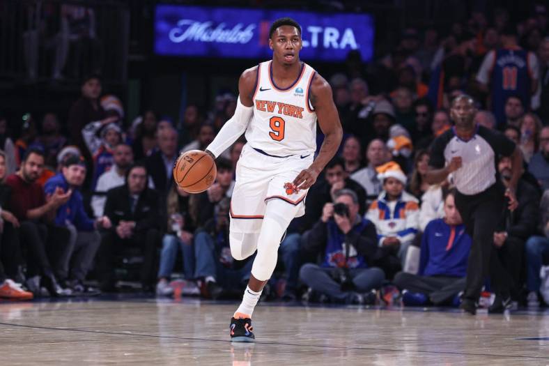 Dec 25, 2023; New York, New York, USA; New York Knicks guard RJ Barrett (9) dribbles up court during the first quarter against the Milwaukee Bucks at Madison Square Garden. Mandatory Credit: Vincent Carchietta-USA TODAY Sports