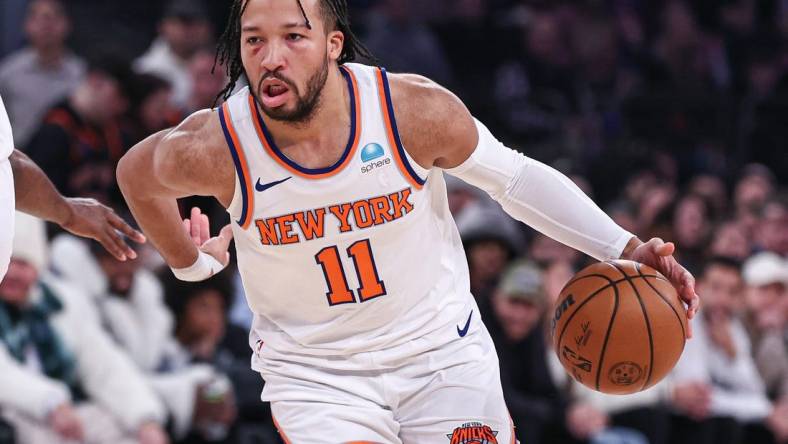 Dec 25, 2023; New York, New York, USA; New York Knicks guard Jalen Brunson (11) dribbles during the first quarter against the Milwaukee Bucks at Madison Square Garden. Mandatory Credit: Vincent Carchietta-USA TODAY Sports