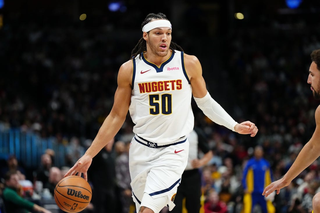 Dec 25, 2023; Denver, Colorado, USA; Denver Nuggets forward Aaron Gordon (50) during  the third quarter against the Golden State Warriors at Ball Arena. Mandatory Credit: Ron Chenoy-USA TODAY Sports