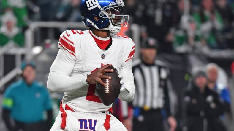 Dec 25, 2023; Philadelphia, Pennsylvania, USA; New York Giants quarterback Tyrod Taylor (2) rolls out the pocket during the third quarter against the New York Giants at Lincoln Financial Field. Mandatory Credit: Eric Hartline-USA TODAY Sports