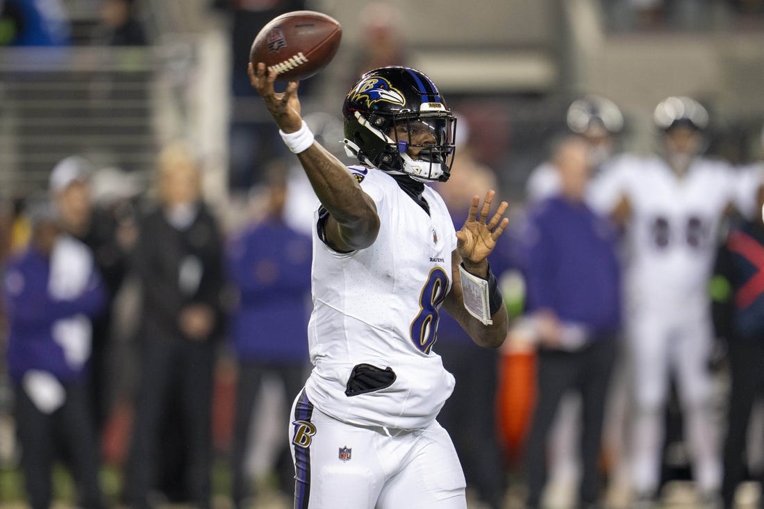 Dec 25, 2023; Santa Clara, California, USA; Baltimore Ravens quarterback Lamar Jackson (8) passes the football against the San Francisco 49ers during the first quarter at Levi's Stadium. Mandatory Credit: Neville E. Guard-USA TODAY Sports