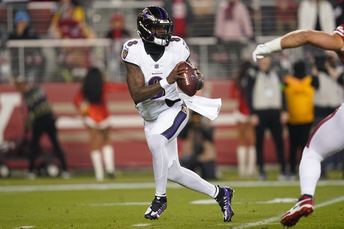 Dec 25, 2023; Santa Clara, California, USA; Baltimore Ravens quarterback Lamar Jackson (8) looks to throw a pass against the San Francisco 49ers in the first quarter at Levi's Stadium. Mandatory Credit: Cary Edmondson-USA TODAY Sports