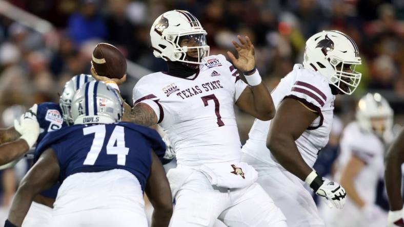 Dec 26, 2023; Dallas, TX, USA; Texas State Bobcats quarterback TJ Finley (7) throws a pass against the Rice Owls in the second quarter at Gerald J Ford Stadium. Mandatory Credit: Tim Heitman-USA TODAY Sports