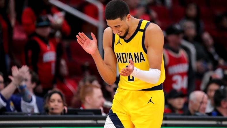 Dec 26, 2023; Houston, Texas, USA; Indiana Pacers guard Tyrese Haliburton (0) reacts in the final seconds against the Houston Rockets during the fourth quarter at Toyota Center. Mandatory Credit: Erik Williams-USA TODAY Sports