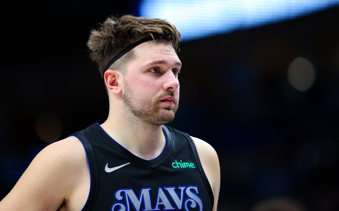 Dec 27, 2023; Dallas, Texas, USA;  Dallas Mavericks guard Luka Doncic (77) reacts during the second half against the Cleveland Cavaliers at American Airlines Center. Mandatory Credit: Kevin Jairaj-USA TODAY Sports