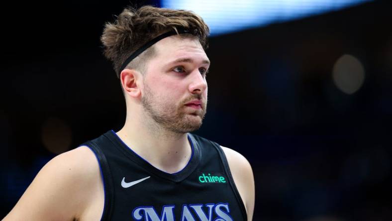 Dec 27, 2023; Dallas, Texas, USA;  Dallas Mavericks guard Luka Doncic (77) reacts during the second half against the Cleveland Cavaliers at American Airlines Center. Mandatory Credit: Kevin Jairaj-USA TODAY Sports