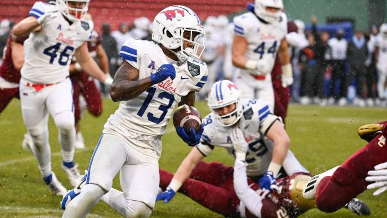 Dec 28, 2023; Boston, MA, USA; Southern Methodist Mustangs wide receiver Roderick Daniels Jr. (13) runs the ball against the Boston College Eagles during the first half at Fenway Park. Mandatory Credit: Eric Canha-USA TODAY Sports