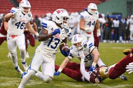 Dec 28, 2023; Boston, MA, USA; Southern Methodist Mustangs wide receiver Roderick Daniels Jr. (13) runs the ball against the Boston College Eagles during the first half at Fenway Park. Mandatory Credit: Eric Canha-USA TODAY Sports