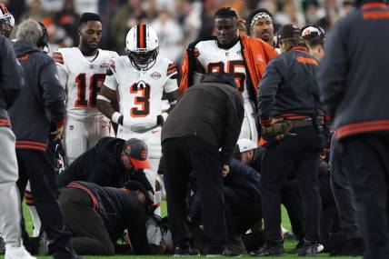 Dec 28, 2023; Cleveland, Ohio, USA; Cleveland Browns wide receiver Elijah Moore (8) is checked on by trainers during the first half against the New York Jets at Cleveland Browns Stadium. Mandatory Credit: Scott Galvin-USA TODAY Sports
