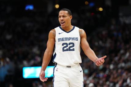 Dec 28, 2023; Denver, Colorado, USA; Memphis Grizzlies guard Desmond Bane (22) reacts in the second half against the Denver Nuggets at Ball Arena. Mandatory Credit: Ron Chenoy-USA TODAY Sports