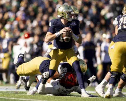 Dec 29, 2023; El Paso, TX, USA; Notre Dame Fighting Irish quarterback Steve Angeli (18) drops back to pass against the Oregon State Beavers defense in the first half at Sun Bowl Stadium. Mandatory Credit: Ivan Pierre Aguirre-USA TODAY Sports