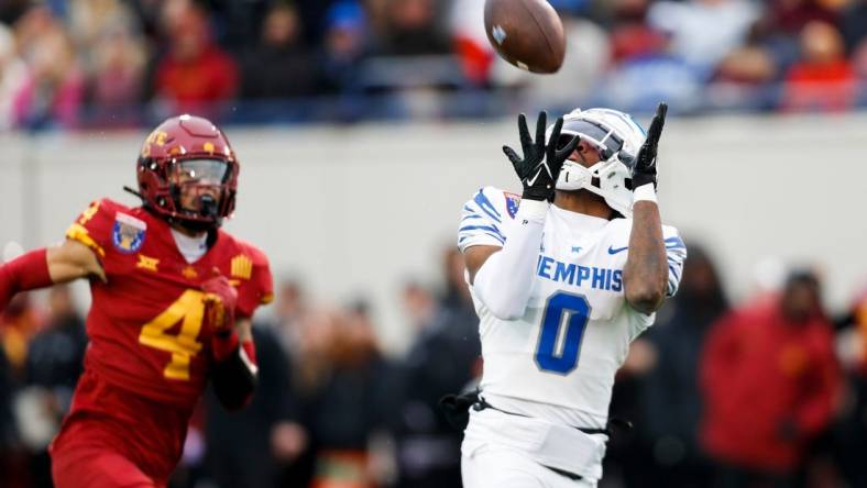 Memphis' Demeer Blankumsee (0) catches a pass for a touchdown in the opening drive during the game between the University of Memphis and Iowa State University in the AutoZone Liberty Bowl at Simmons Bank Liberty Stadium on Dec. 29, 2023.