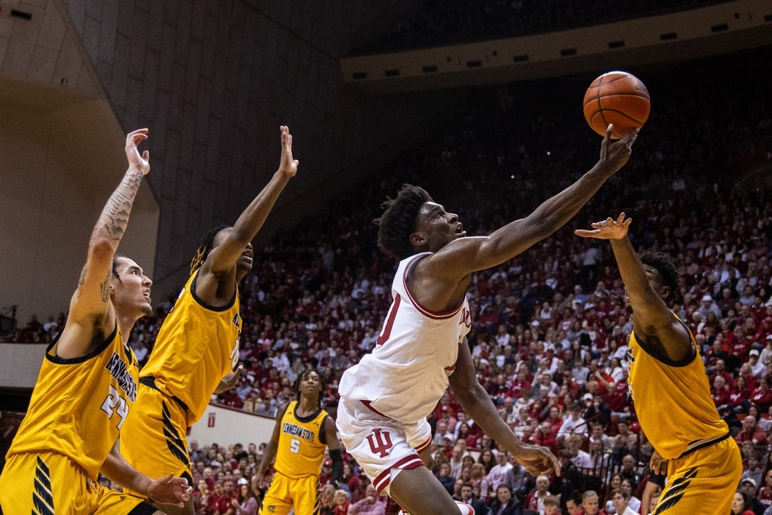 Dec 29, 2023; Bloomington, Indiana, USA; Indiana Hoosiers forward Kaleb Banks (10) shoots the ball while Kennesaw State Owls defend in the first half at Simon Skjodt Assembly Hall. Mandatory Credit: Trevor Ruszkowski-USA TODAY Sports