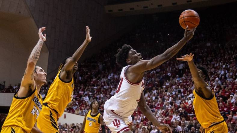 Dec 29, 2023; Bloomington, Indiana, USA; Indiana Hoosiers forward Kaleb Banks (10) shoots the ball while Kennesaw State Owls defend in the first half at Simon Skjodt Assembly Hall. Mandatory Credit: Trevor Ruszkowski-USA TODAY Sports