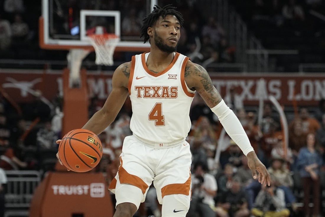 Dec 29, 2023; Austin, Texas, USA; Texas Longhorns guard Tyrese Hunter (4) dribbles during the first half against UNC Greensboro at Moody Center. Mandatory Credit: Scott Wachter-USA TODAY Sports