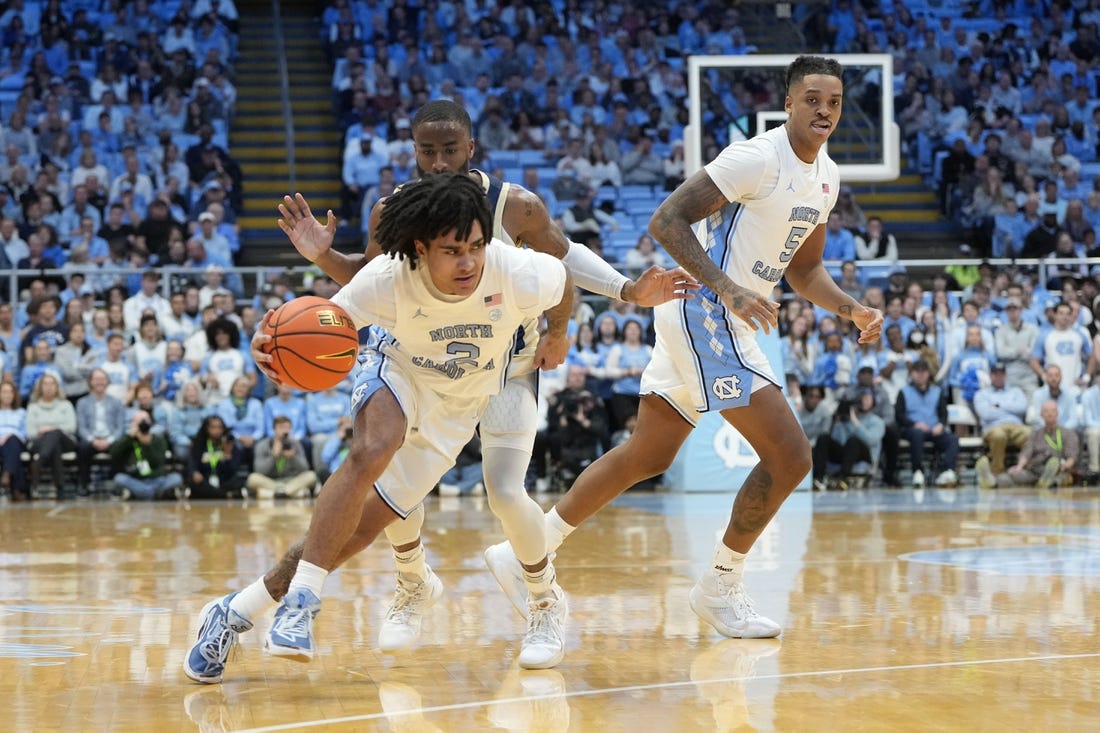 Dec 29, 2023; Chapel Hill, North Carolina, USA; North Carolina Tar Heels guard Elliot Cadeau (2) dribbles in the first half at Dean E. Smith Center. Mandatory Credit: Bob Donnan-USA TODAY Sports