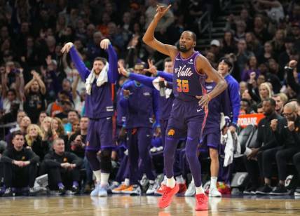 Dec 29, 2023; Phoenix, Arizona, USA; Phoenix Suns forward Kevin Durant (35) reacts against the Charlotte Hornets during the second half at Footprint Center. Mandatory Credit: Joe Camporeale-USA TODAY Sports